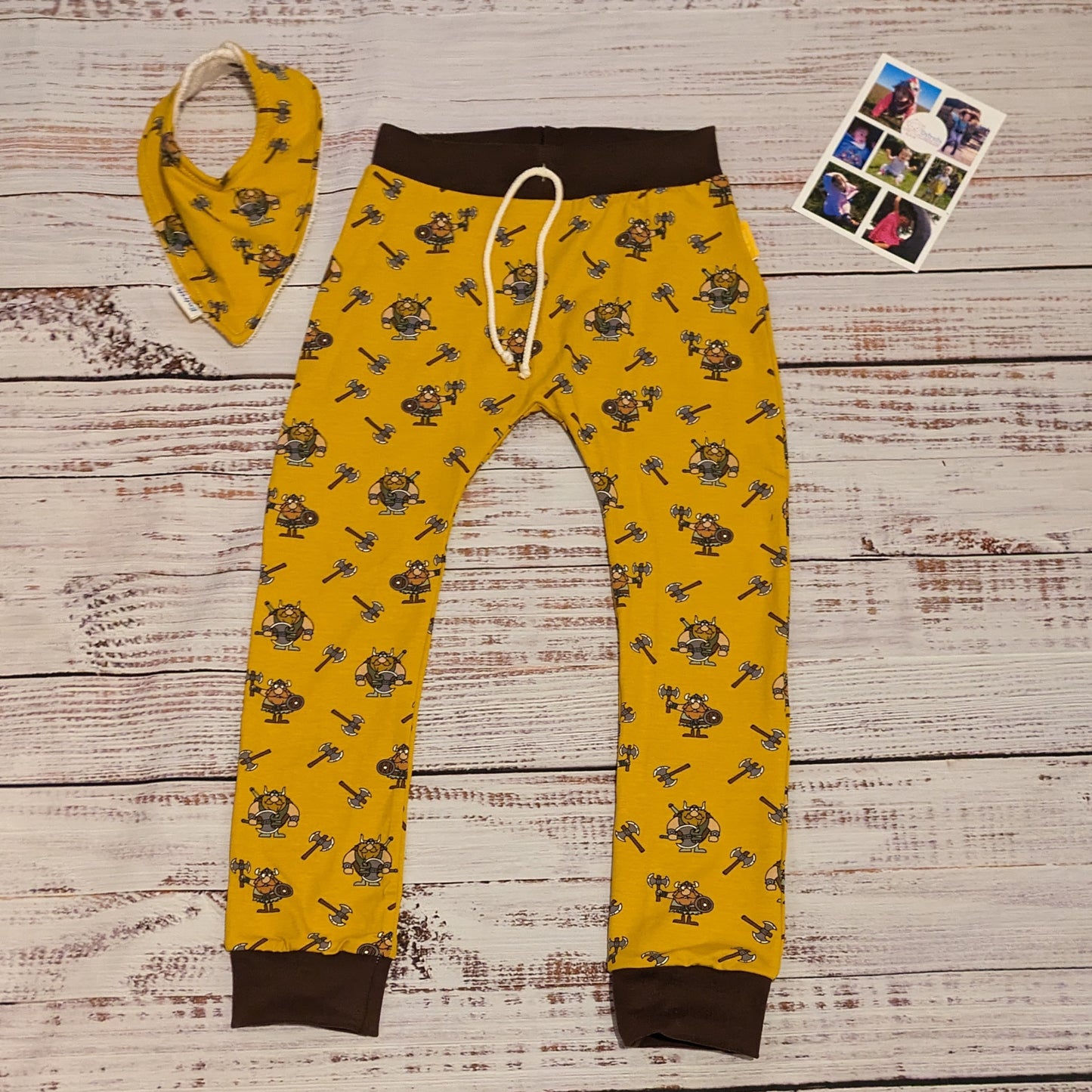 Adorably fun mustard Vikings harem joggers. Lovingly handmade using mustard Vikings and chocolate cotton jersey's. Shown with a matching bamboo bib.