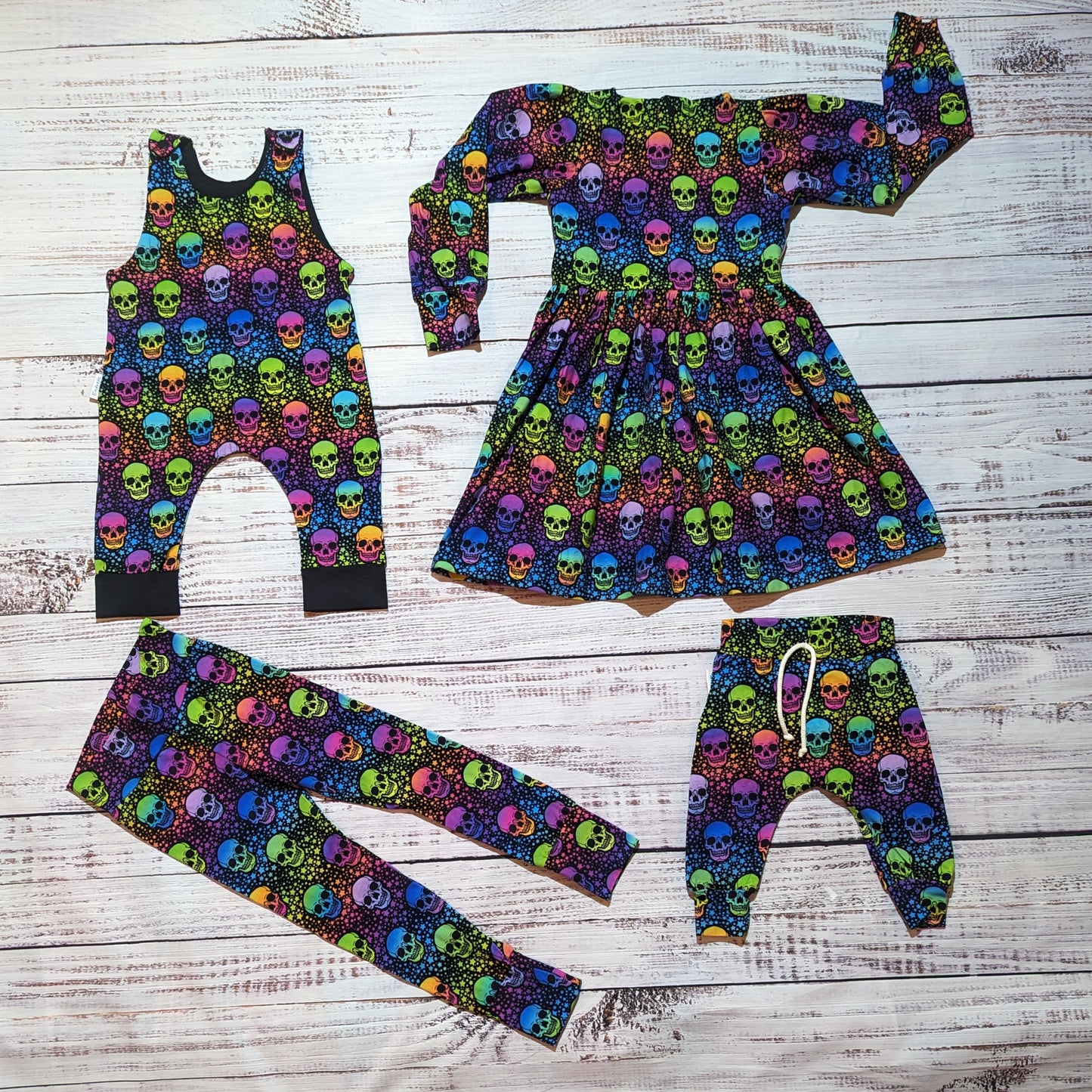 The colourful and fun neon skulls range. Featuring harem joggers, leggings for adults and kids, sleeveless rompers and dresses.