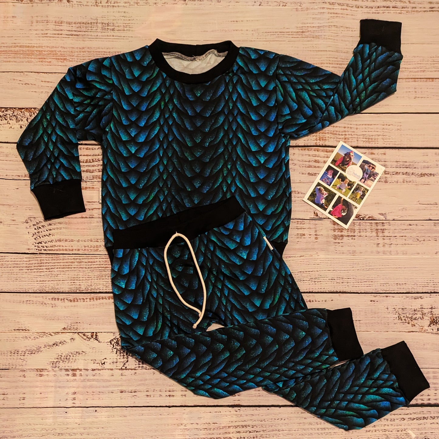 The gorgeously glimmering dragon scales harem joggers. Handmade using dragon scales cotton French terry and black cotton ribbing. Shown as a set with a matching sweatshirt.