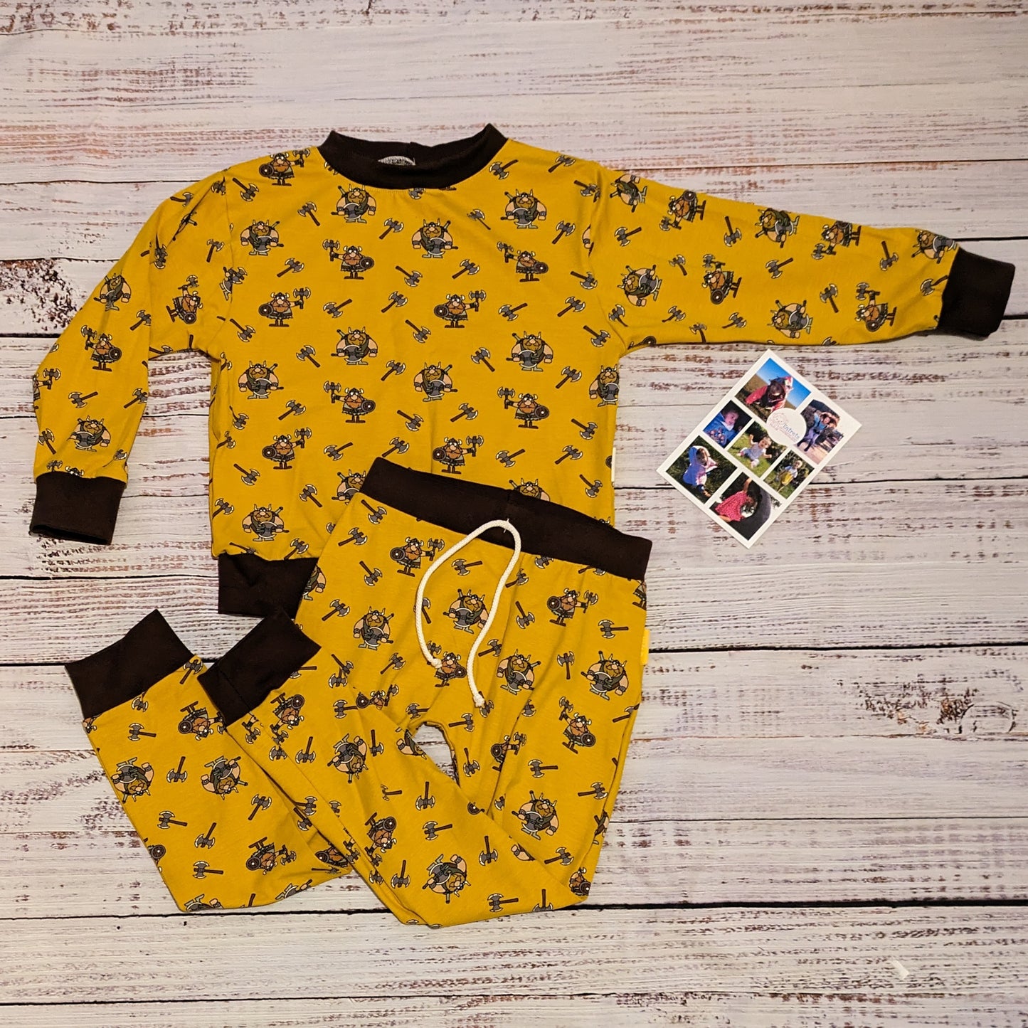 Adorably fun mustard Vikings harem joggers. Lovingly handmade using mustard Vikings and chocolate cotton jersey's. Shown as a set with a matching sweatshirt and bamboo bib.
