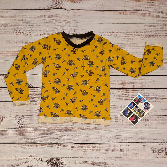 The fearsome mustard Vikings T-shirt. Lovingly handmade using mustard Vikings cotton jersey and chocolate cotton ribbing. Shown with long sleeves.