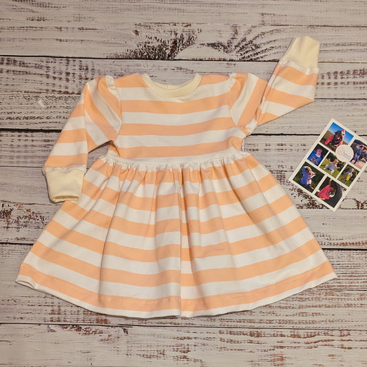 Warm and comfy sweater dress, handmade using pink striped cotton French terry and cream cotton ribbing.