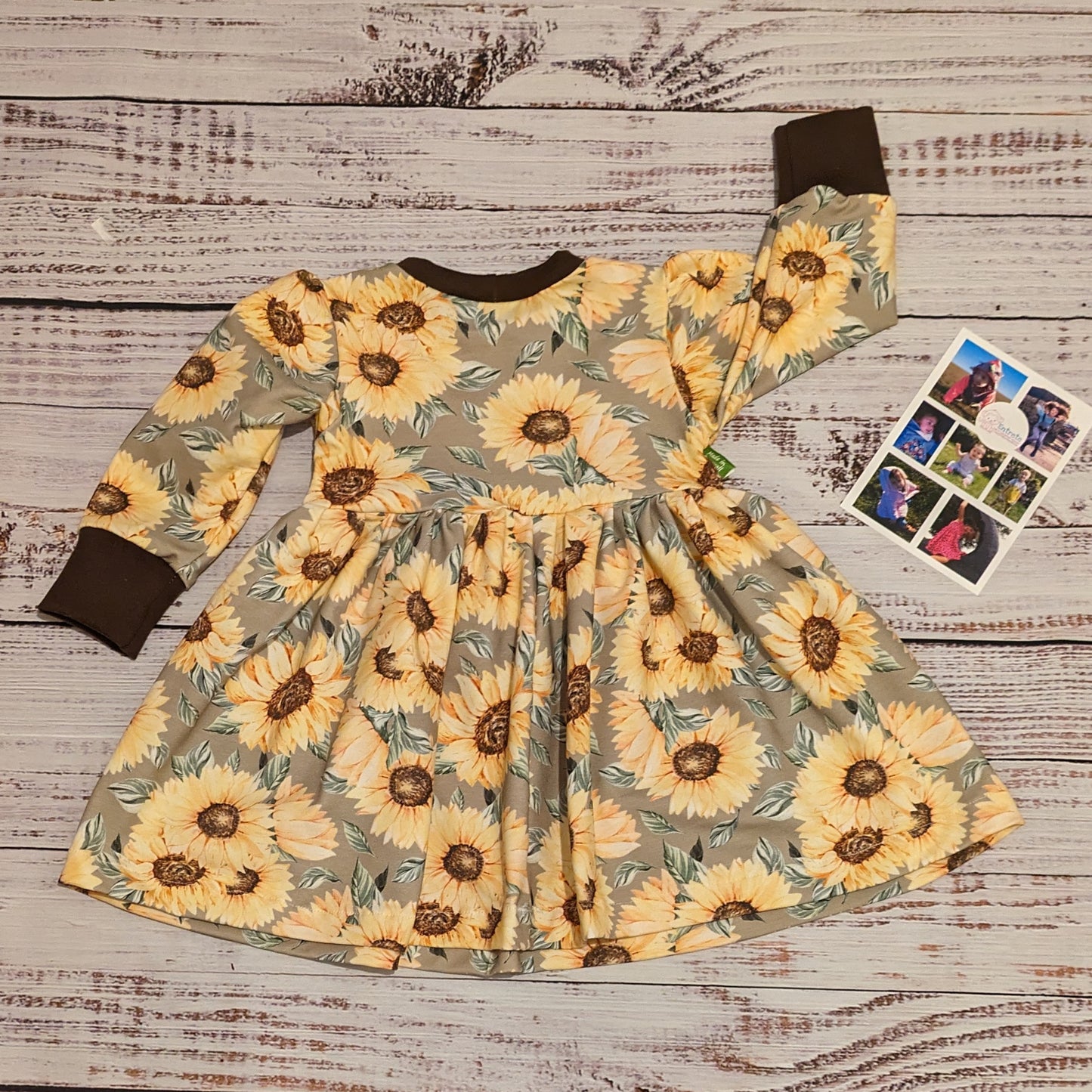 The fabulous sunflower sweater dress handmade using sunflowers cotton French terry and chocolate cotton ribbing. Shown from the rear.