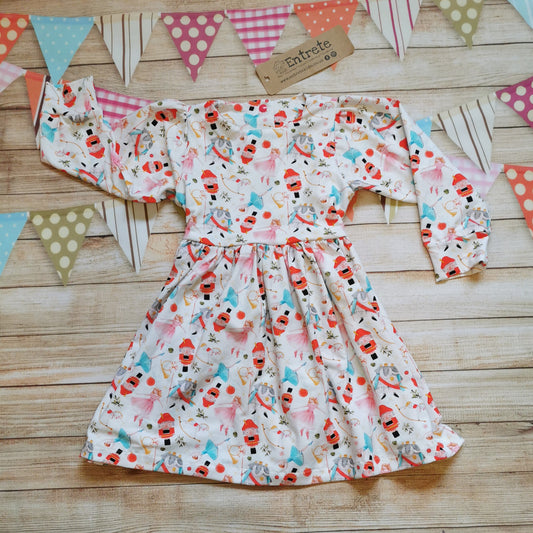 Girls Christmas dress, handmade using the beautiful white nutcracker cotton jersey.