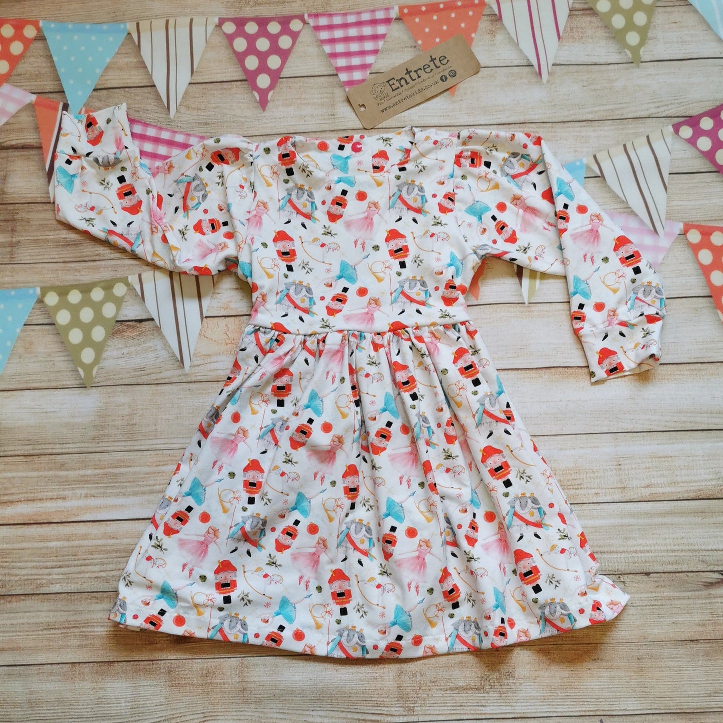 Girls Christmas dress, handmade using the beautiful white nutcracker cotton jersey.