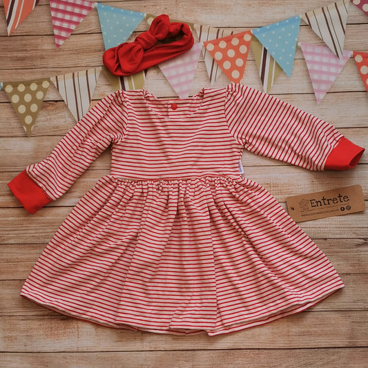 Soft and comfy girls dress, handmade using red striped cotton jersey and red cotton jersey. Shown with a matching red headband (sold separately)