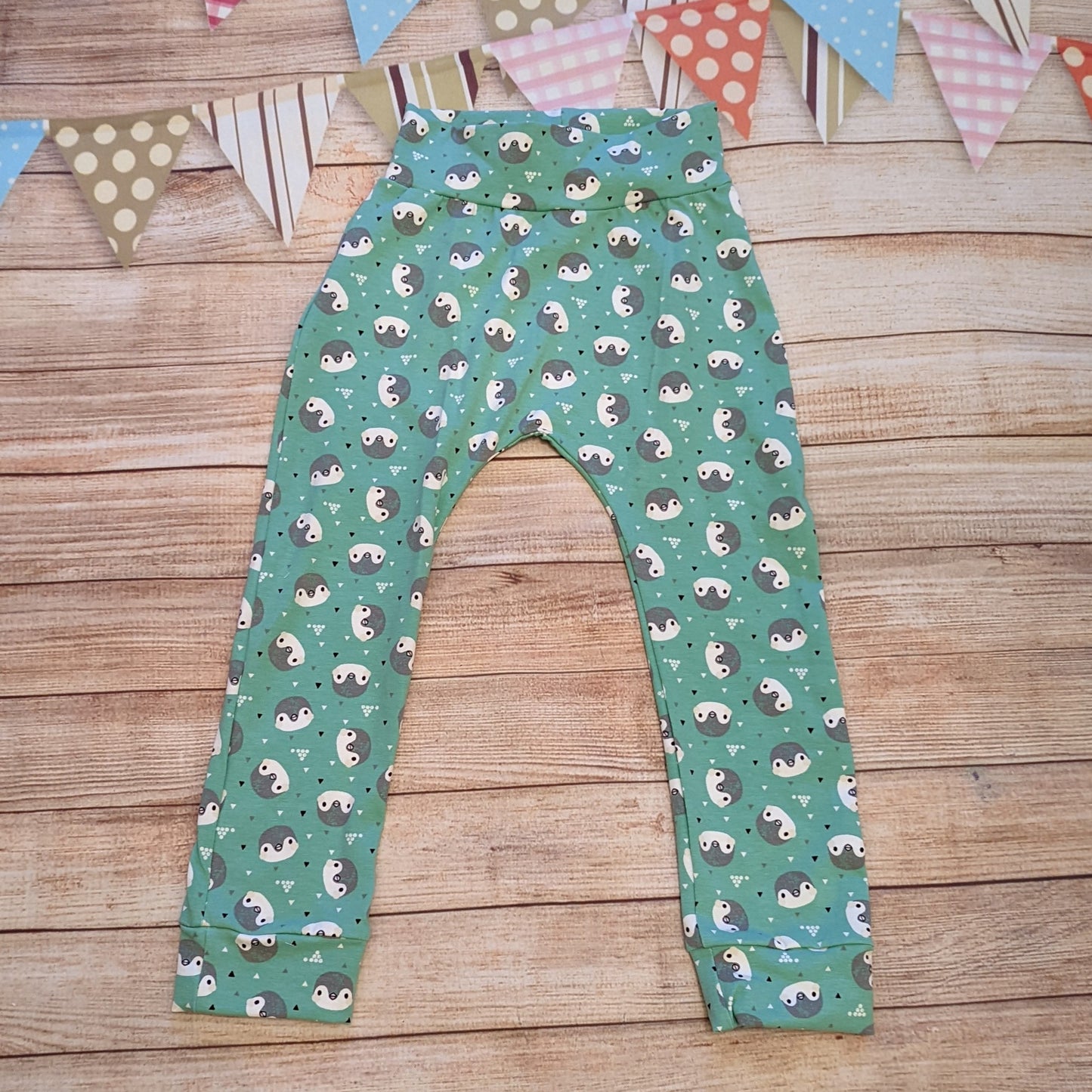 Adorable and ethical, organic mint penguins harem joggers. Handmade using mint penguins organic cotton jersey.