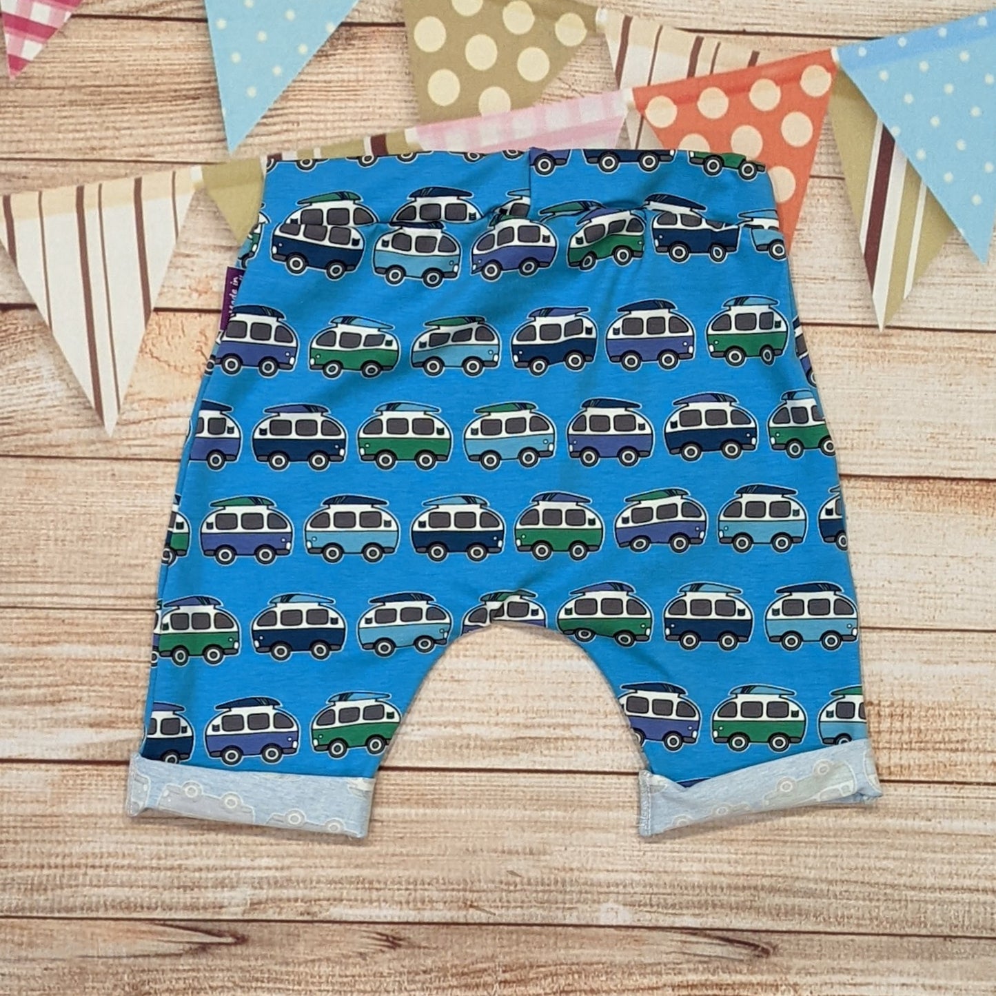 The epic blue surf camper Harem shorts, handmade using blue surf campervan cotton jersey. Shown from the rear.