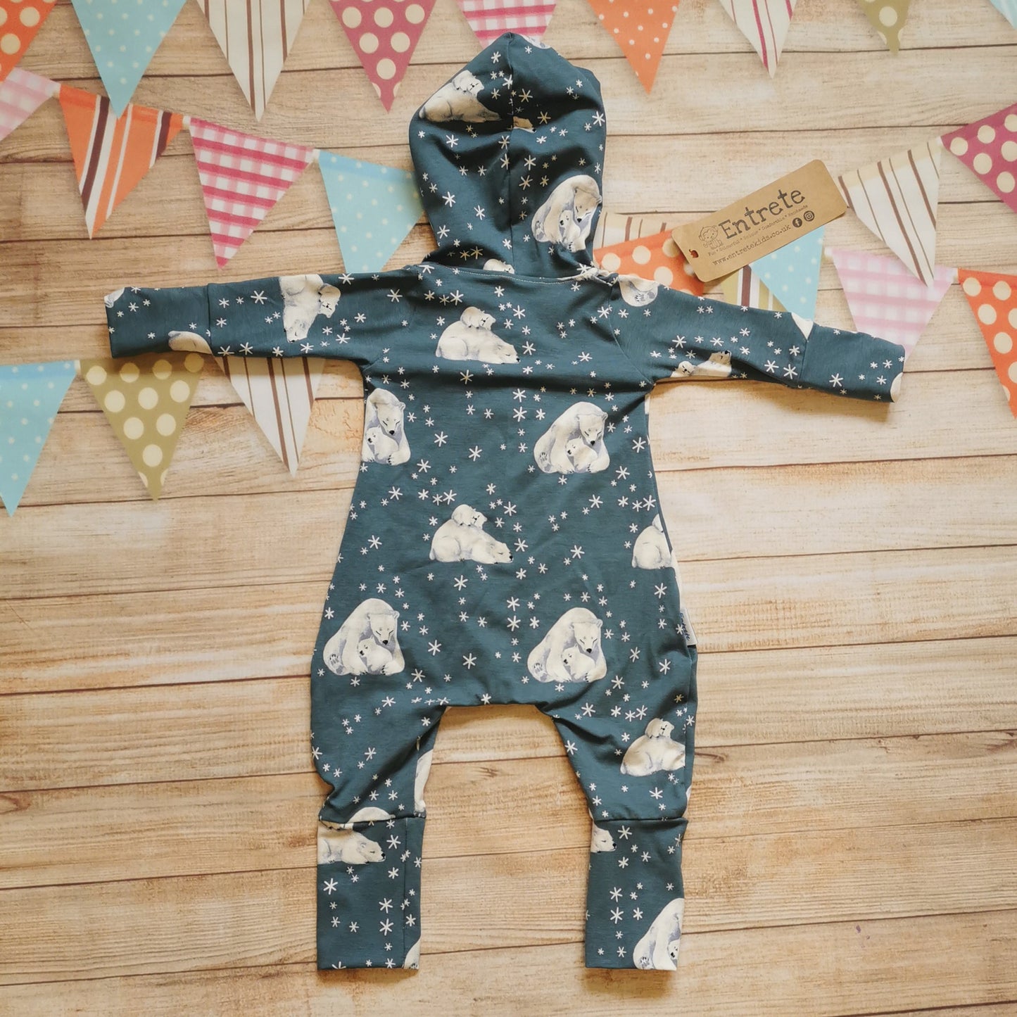 Back of the hooded Christmas bear romper.