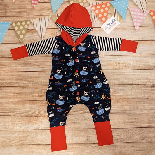 Fun and adventure await, with the awesome pirate cats hooded romper. Handmade using pirate cats, red and monochrome striped cotton jersey's.