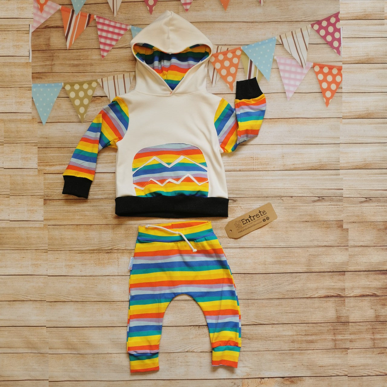Colourful red rainbow striped harem joggers, shown as a set with a matching hoodie (sold separately).