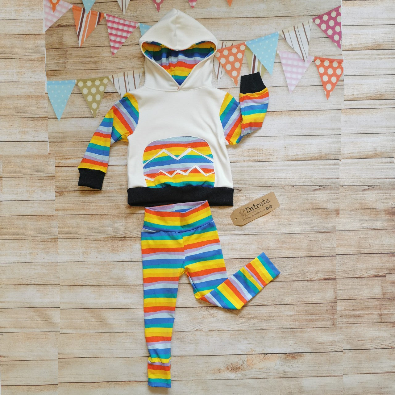 Colourful red rainbow striped leggings shown as a set with a matching broken egg hoodie. (sold separately)