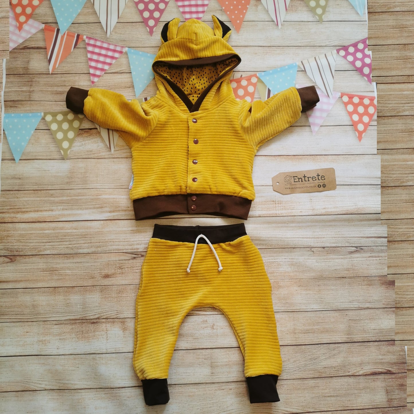 Front view of the amazing reversible lion cub hoodie. Handmade with ochre corduroy and chocolate ribbing with ears on the hood. Shown with matching ochre corduroy harem joggers. (sold separately)