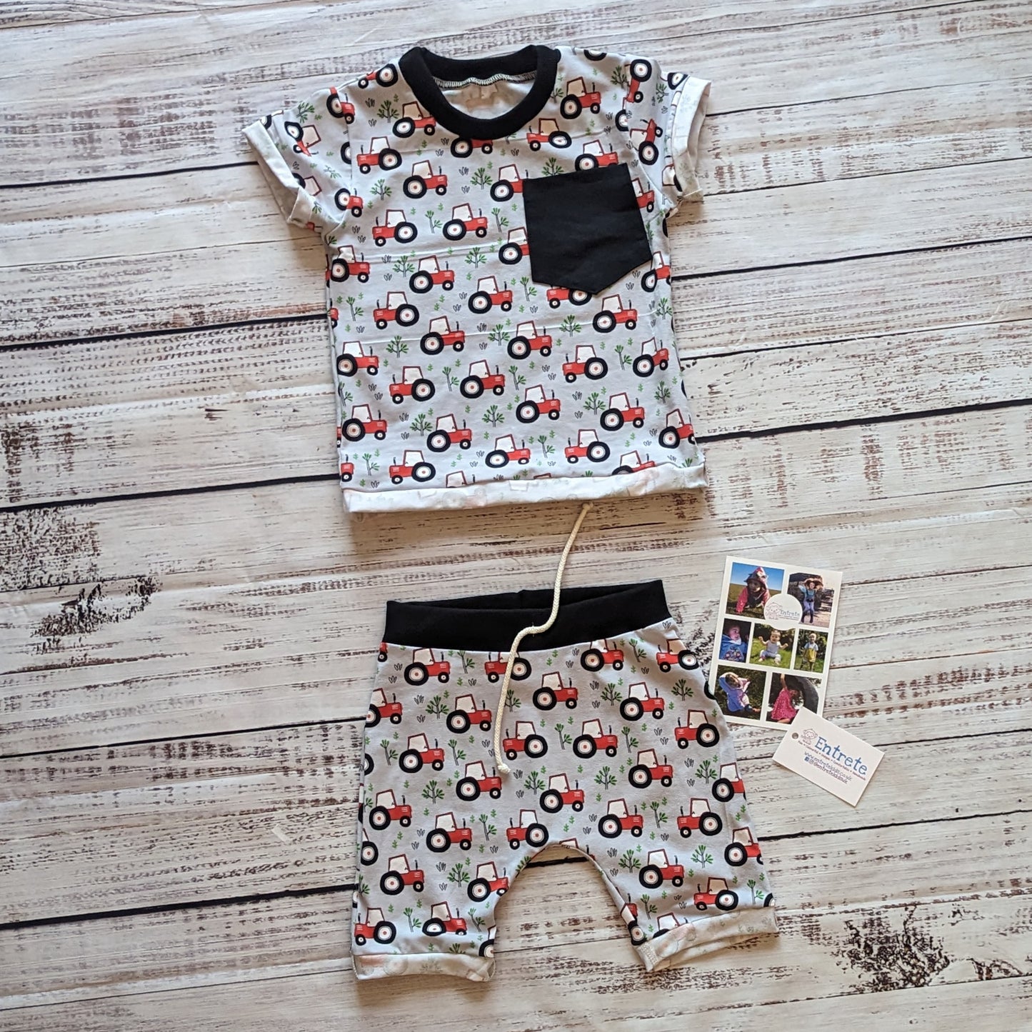Farming fun with this red tractors on grey T-shirt, with it's contrasting front pocket. Shown as an outfit with matching harem shorts.