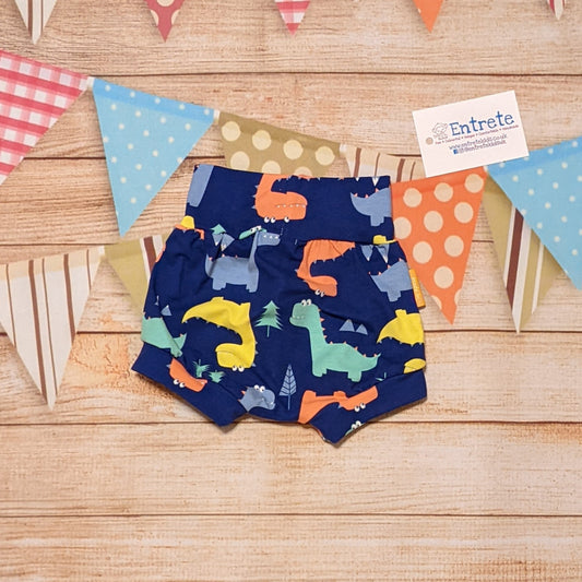 The soft, comfy and prehistorically fun blue dinosaur shorts. Handmade using blue dinosaurs cotton jersey.
