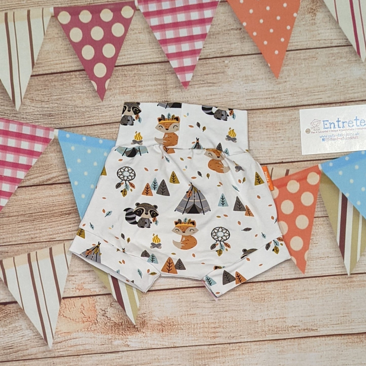 Cute foxes and raccoons shorts, handmade using native American animals cotton jersey. Shown from the rear.