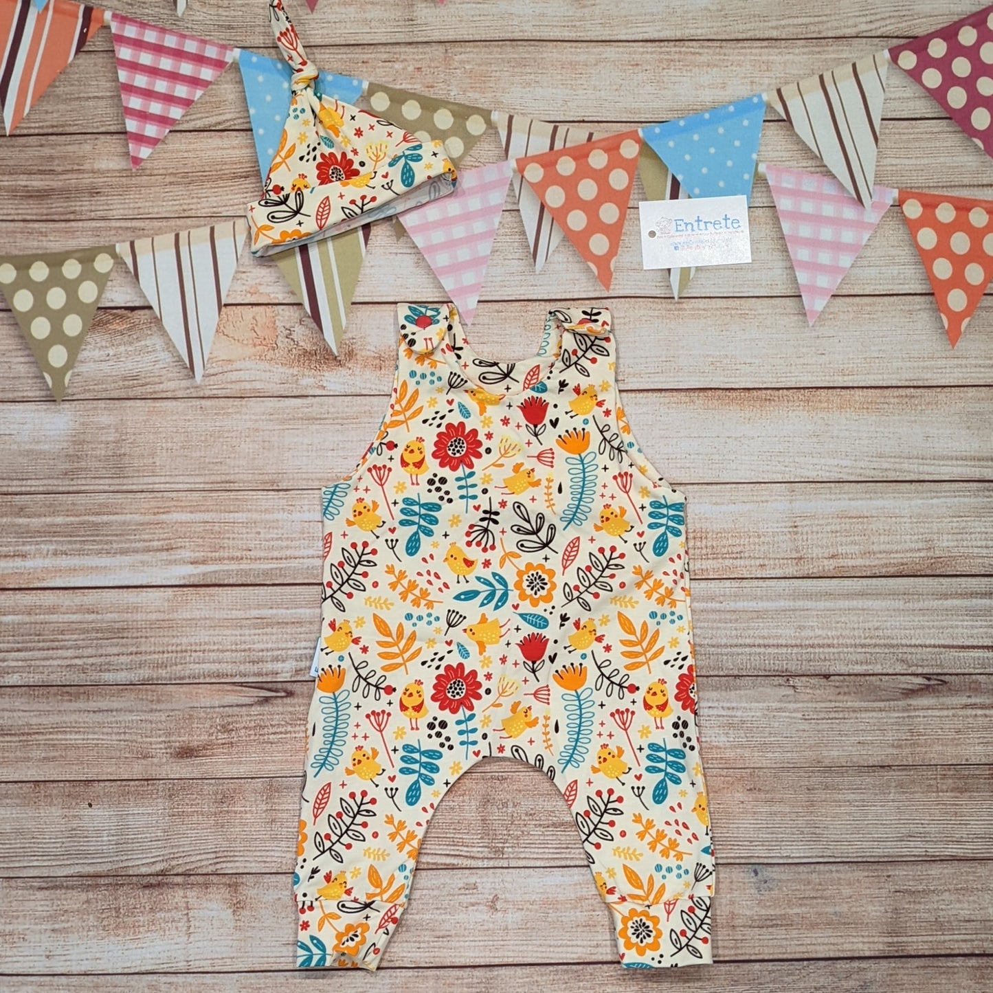 The gorgeous cream chicks and flowers sleeveless romper, perfect for spring. Handmade using cream chicks cotton jersey. Shown with a cream chicks tie top hat (sold separately).