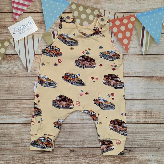 The fun retro hippie cars sleeveless romper, handmade using light yellow hippie cars cotton jersey.