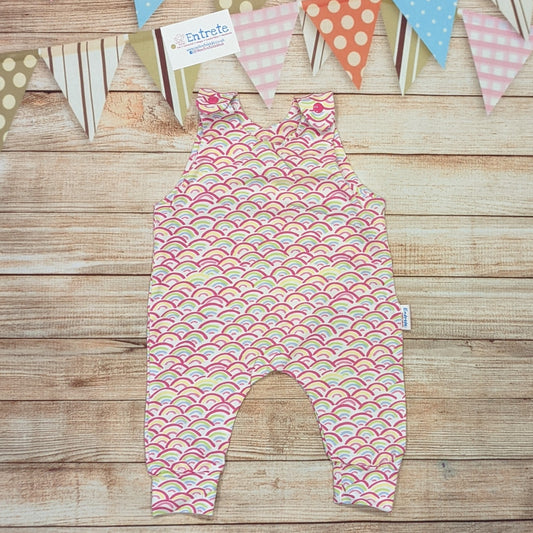 The adorable mini rainbows sleeveless romper. Handmade using mini rainbows on white cotton jersey.