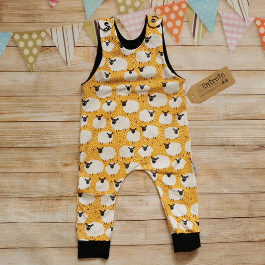 The fun mustard sheep romper, perfect for your little lamb. Handmade using mustard sheep and black cotton jerseys'.