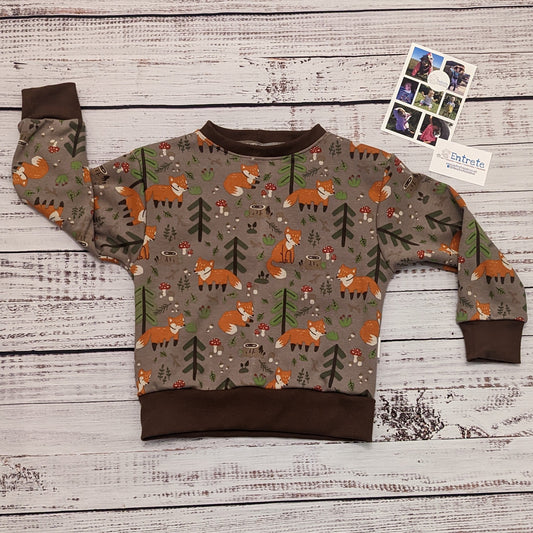The warm, sumptuously soft and fun forest foxes sweatshirt. Handmade using brown forest foxes alpine fleece and brown cotton ribbing.