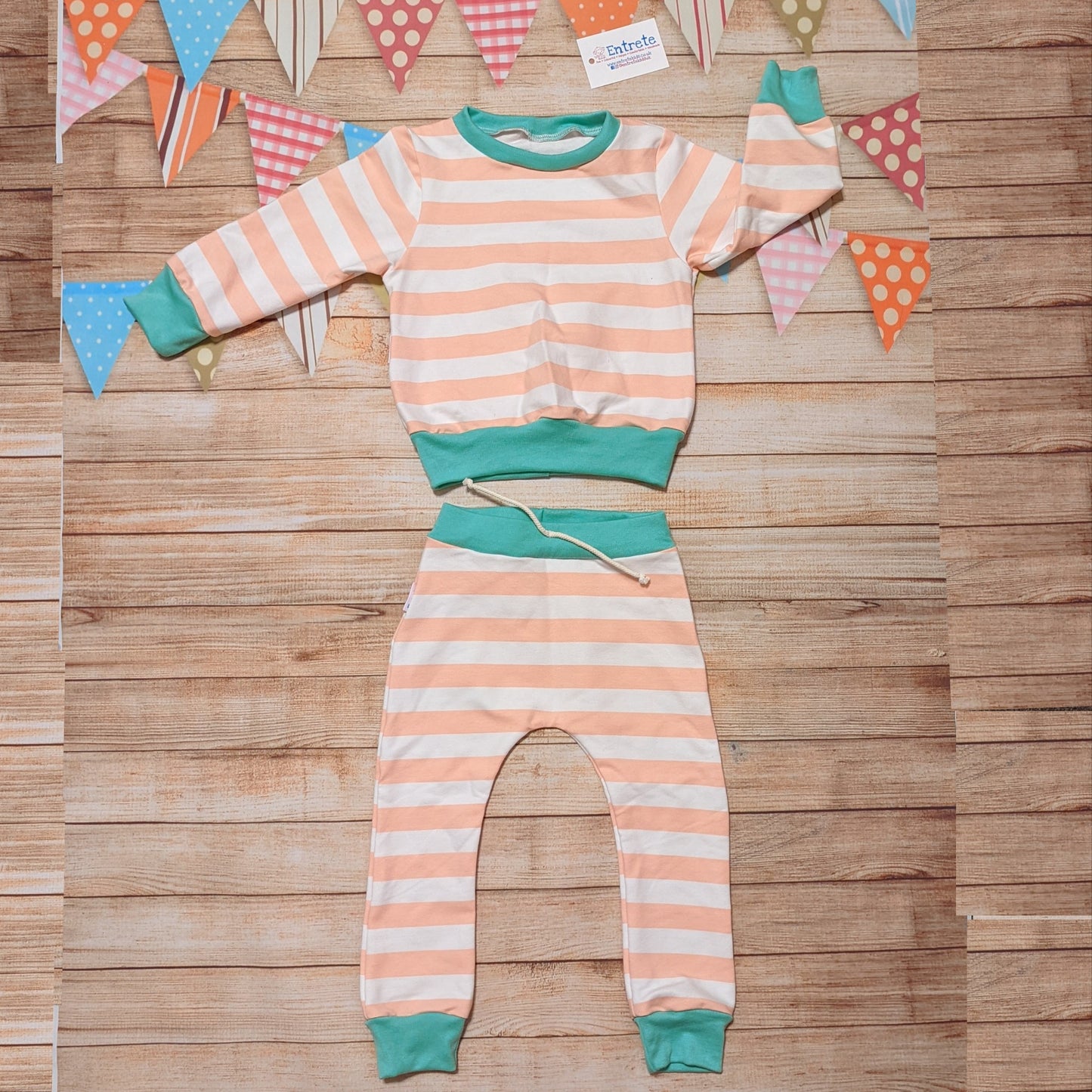 Pink and white striped harem joggers. Handmade with pink striped cotton French terry and mint cotton ribbing. Shown as an outfit with a pink striped sweatshirt (sold separately).