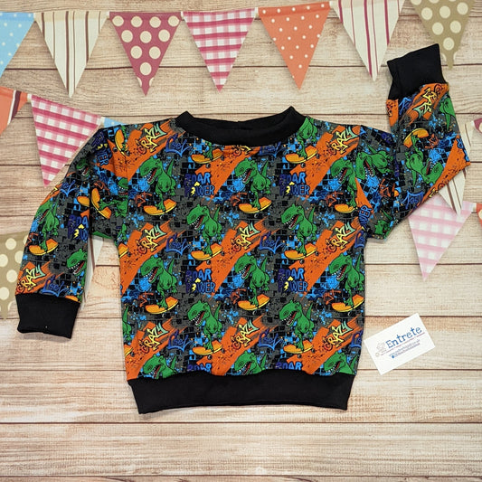 The insanely fun skateboarding dinosaurs sweatshirt. Handmade using street dino cotton French terry and black cotton ribbing.