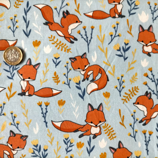 Your baby gift set will be handmade using the adorable sky blue foxes cotton jersey.