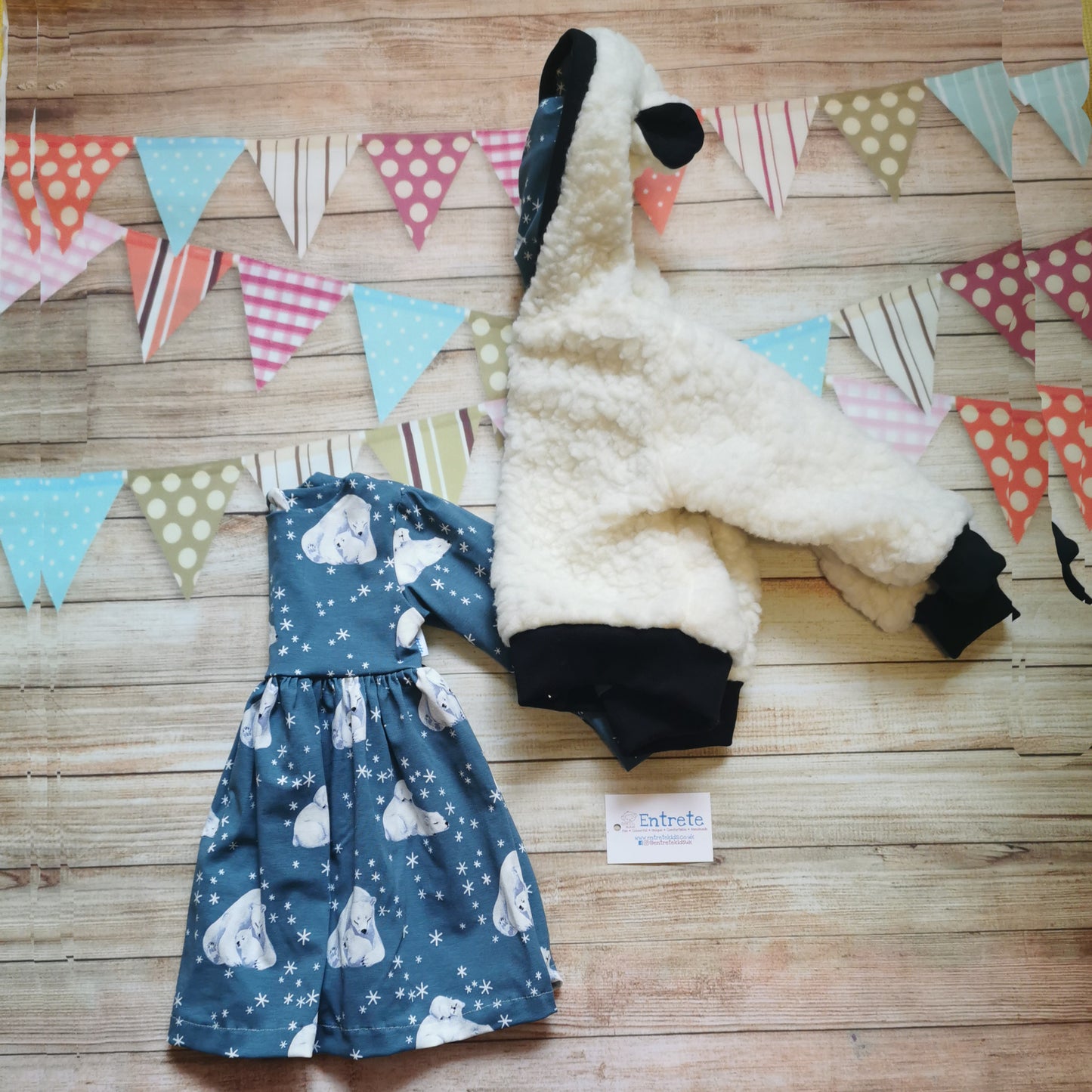 Sherpa polar bear hoodie shown as an outfit with matching long sleeve dress. (sold separately).