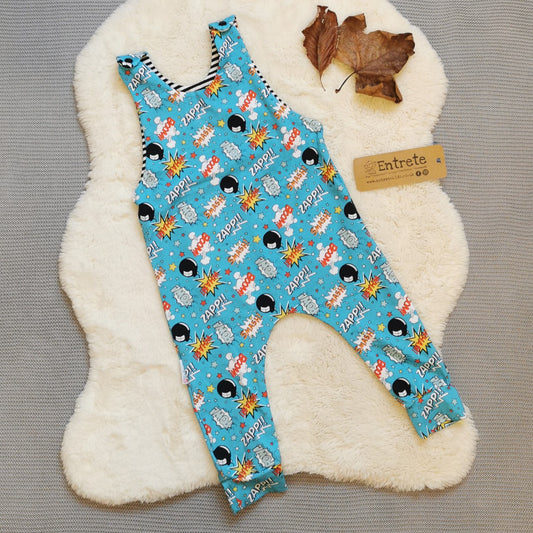 The vibrant and fun turquoise boom pow wow sleeveless romper. Handmade using turquoise boom pow wow and monochrome striped cotton jerseys'.