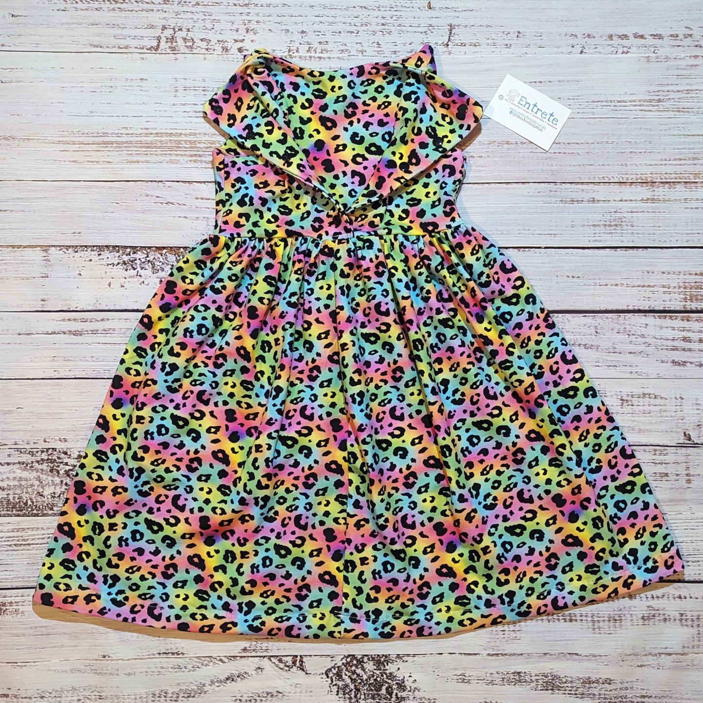The gorgeous rainbow leopard print sleeveless dress. Lovingly handmade in soft and comfy cotton jersey. Shown with it's back popper entry open.
