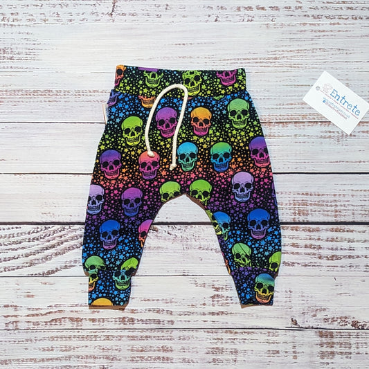 Colourful and fun neon skulls harem joggers. Handmade in soft and stretchy cotton jersey, with an elasticated waist.
