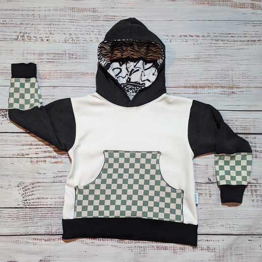 Front of the colourful animal print and mint checked adults hoodie. With mint checked front pocket and arm detailing and an animal hearts hood lining.