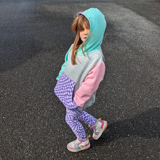 Sophie showing off her purple trippy checked hoodie and leggings.