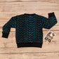 The gorgeous glimmering dragon scales sweatshirt. Handmade using dragon scales cotton French terry and black cotton ribbing. Showing the long sleeve version from the back.
