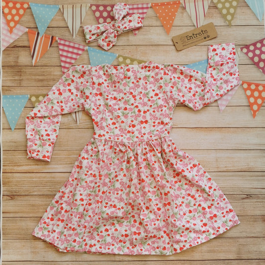 Fresh smelling girls fragranced dress. Handmade with fragranced strawberries and cream cotton jersey. Shown with a matching headband (sold separately)