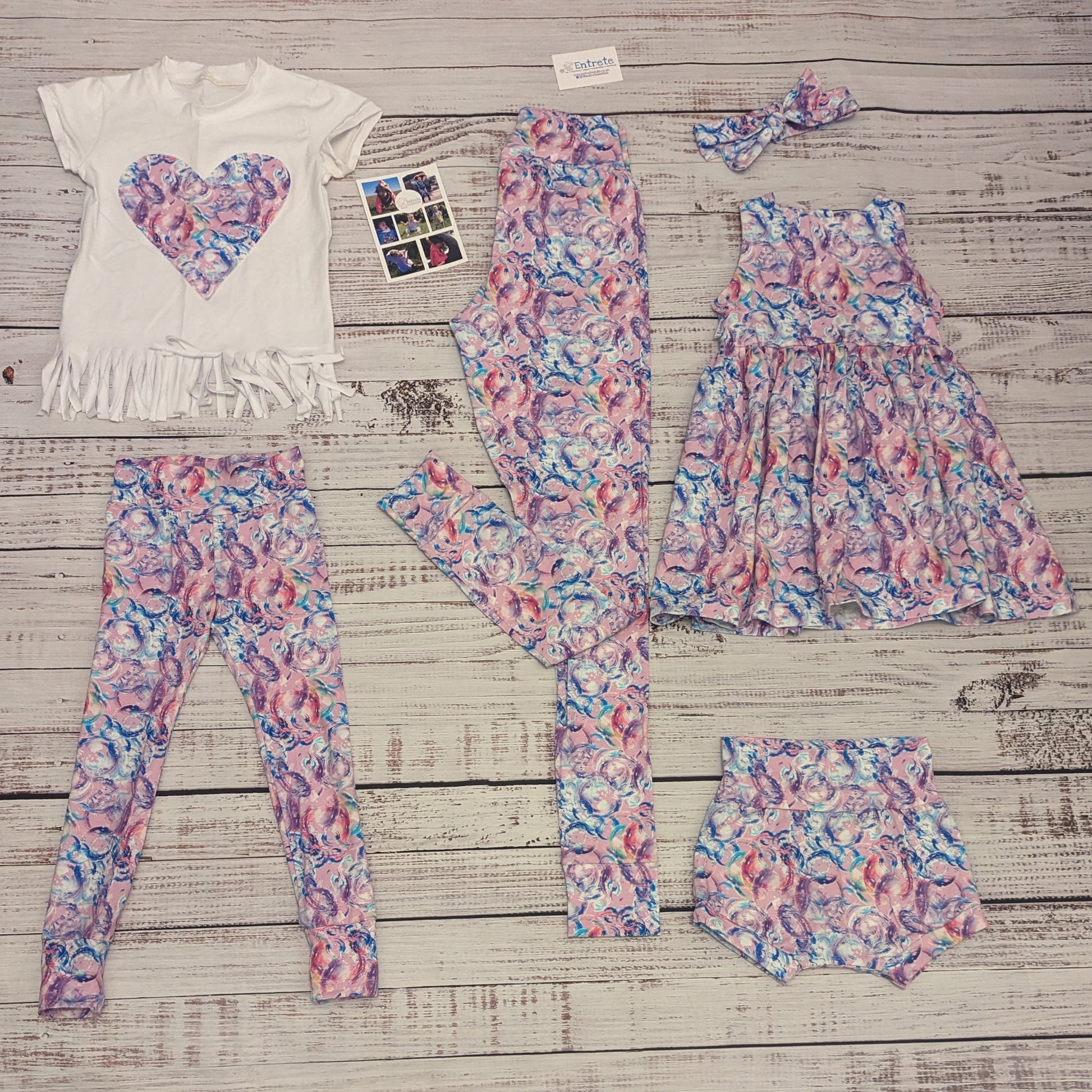 The entire bubblegum pink bubbles heart collection. Including Tassel tee, dress, shorts, leggings and adult leggings