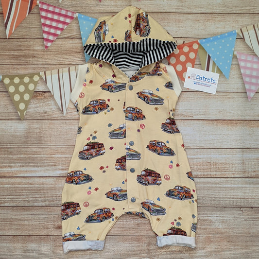 The fun retro hippie cars bummie romper, perfect for your little surf dude this summer. Handmade using light yellow hippie cars and monochrome striped cotton jersey's.