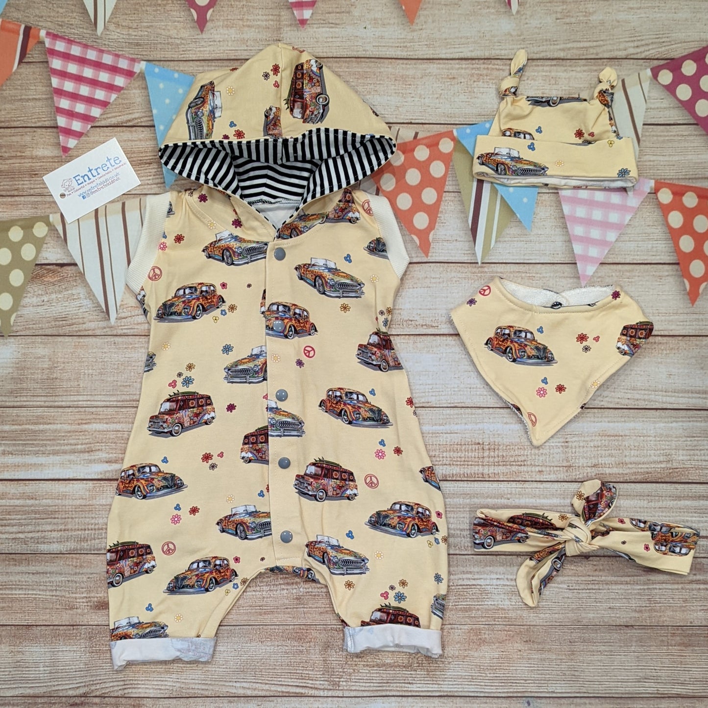 The fun retro hippie cars bummie romper, perfect for your little surf dude this summer. Handmade using light yellow hippie cars and monochrome striped cotton jersey's. Shown with matching tie top hat, bamboo bib and headband.