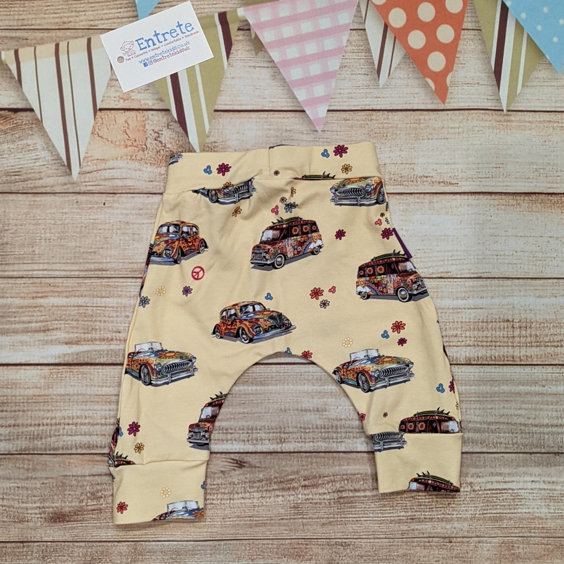 The fun retro hippie cars harem joggers, handmade using light yellow hippie cars cotton jersey. Shown from the rear.