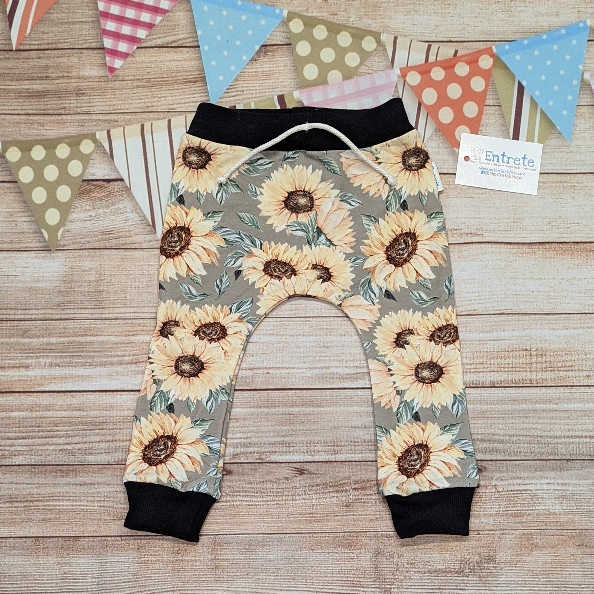 Pretty sunflowers harem joggers, handmade using sunflowers cotton French terry and black cotton ribbing.