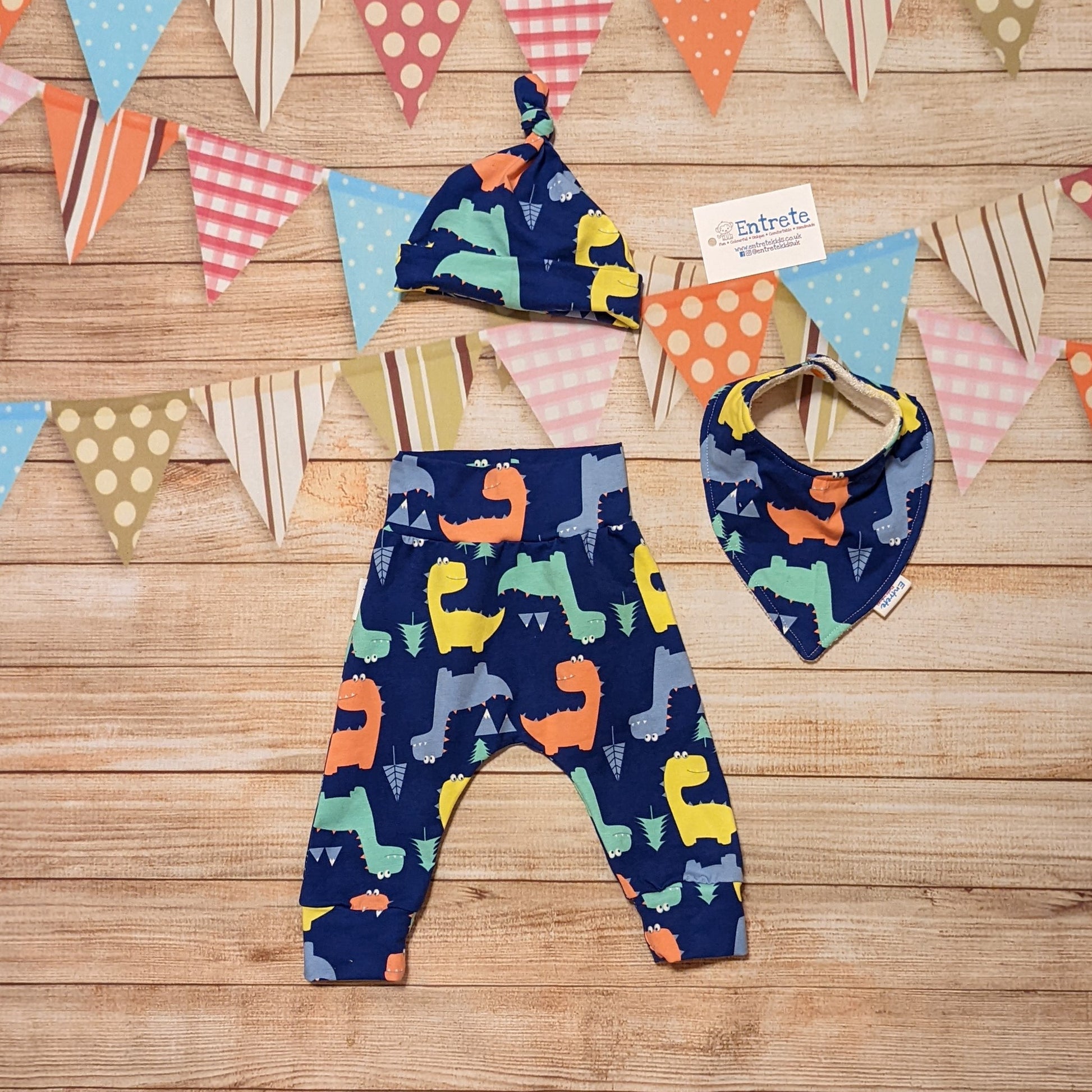 Prehistoric fun with the blue dinosaur harem pants. Handmade using blue dinosaur cotton jersey. Shown with a selection of matching accessories (sold separately) Perfect for your little dinosaur fanatic!