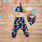 Prehistoric fun with the blue dinosaur harem pants. Handmade using blue dinosaur cotton jersey. Shown with a selection of matching accessories (sold separately) Perfect for your little dinosaur fanatic!