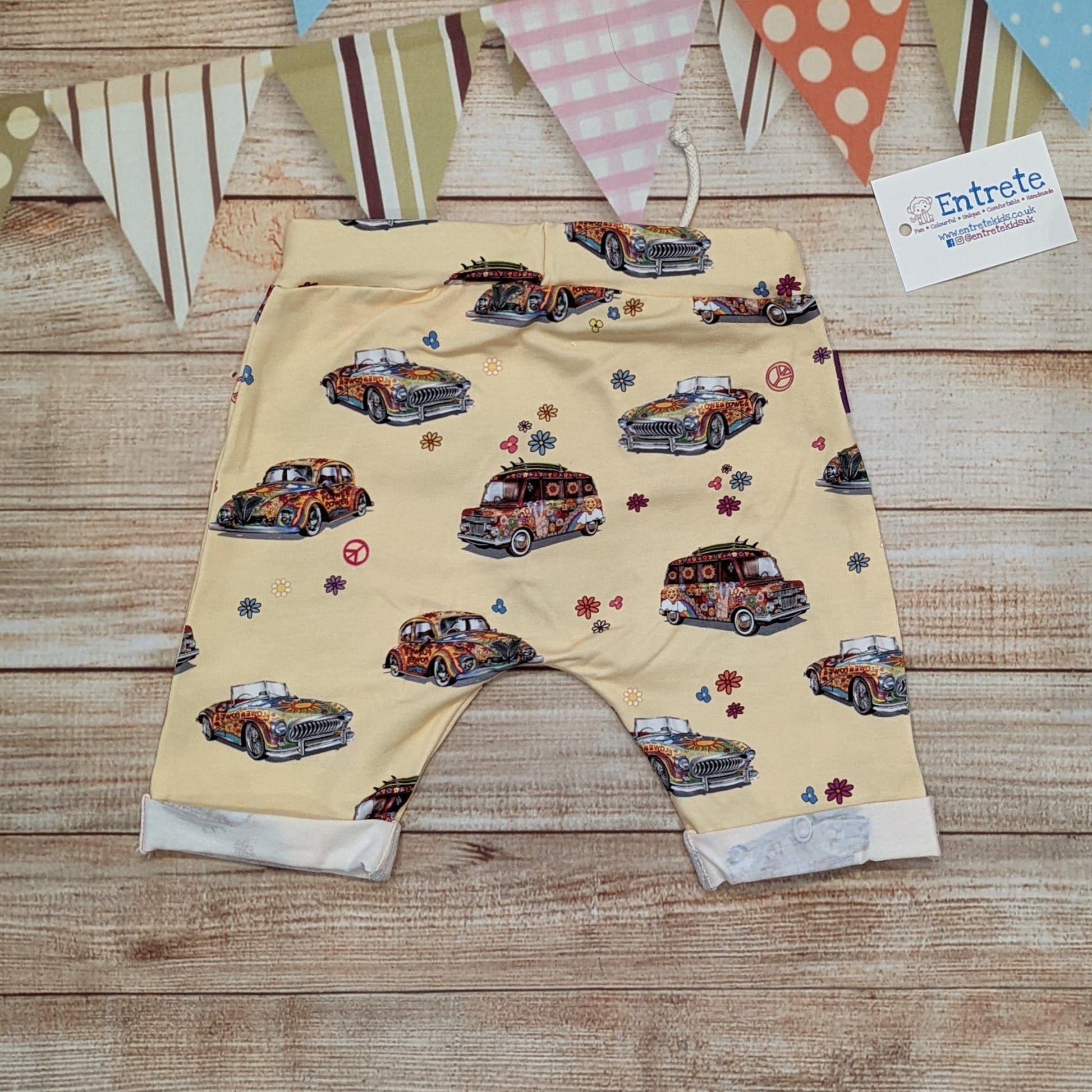 The fun retro hippie cars harem shorts, handmade using light yellow hippie cars cotton jersey. Shown from the rear.