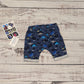 Kids sea creatures harem shorts. Handmade using navy sea life shadows cotton jersey. Shown from the rear.