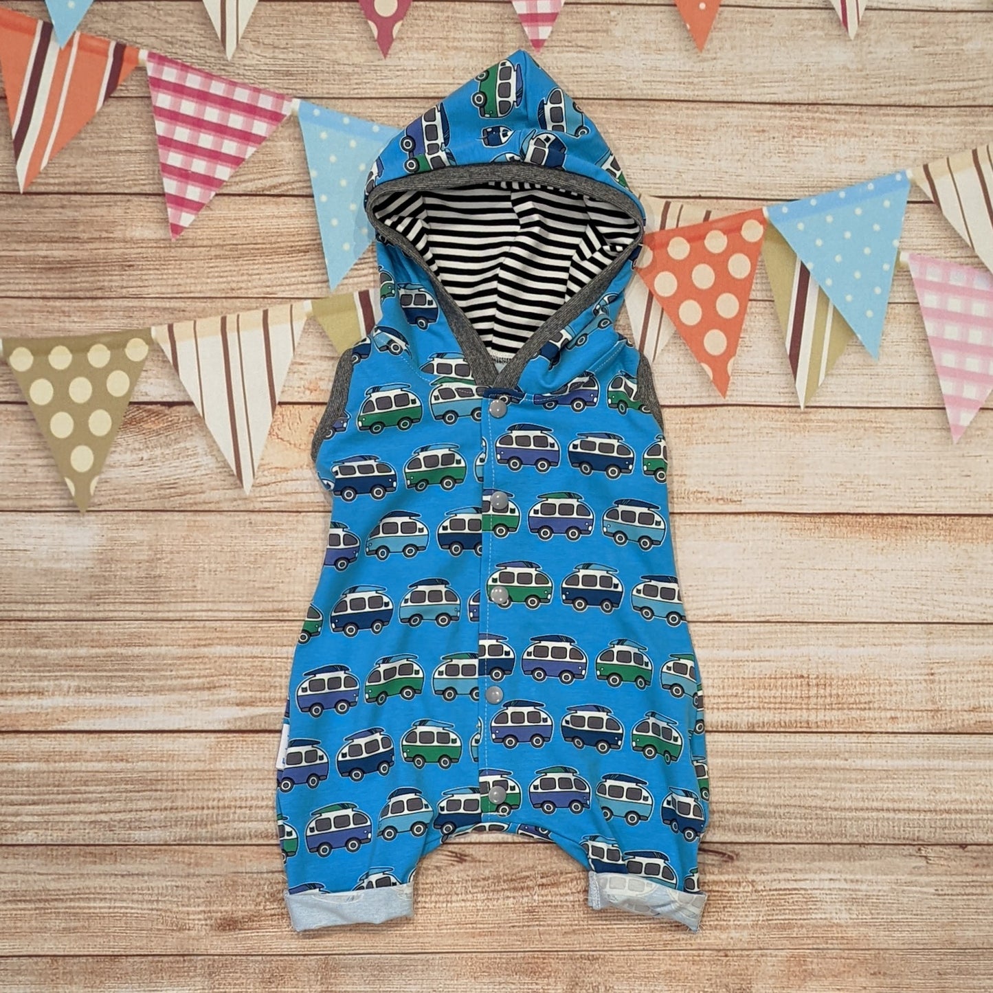 The epic blue surf campervan bummie romper. Handmade using blue surf campervan and monochrome striped cotton jersey's with graphite cotton ribbing.
