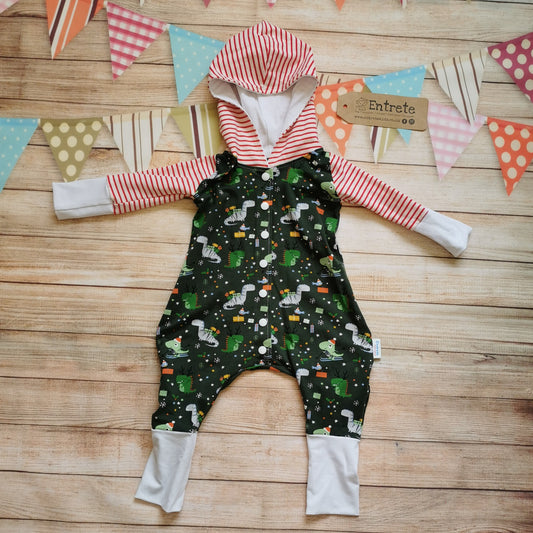 The roarsome Christmas dinosaurs hooded popper romper. Handmade using dark green festasaurus, red striped and white cotton jerseys. Perfect for the dinosaur fanatic in your life! 