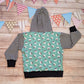 Adorable mint penguins and striped hoodie. Handmade using mint penguins organic cotton jersey, monochrome striped cotton jersey and black cotton ribbing. Shown from the rear.