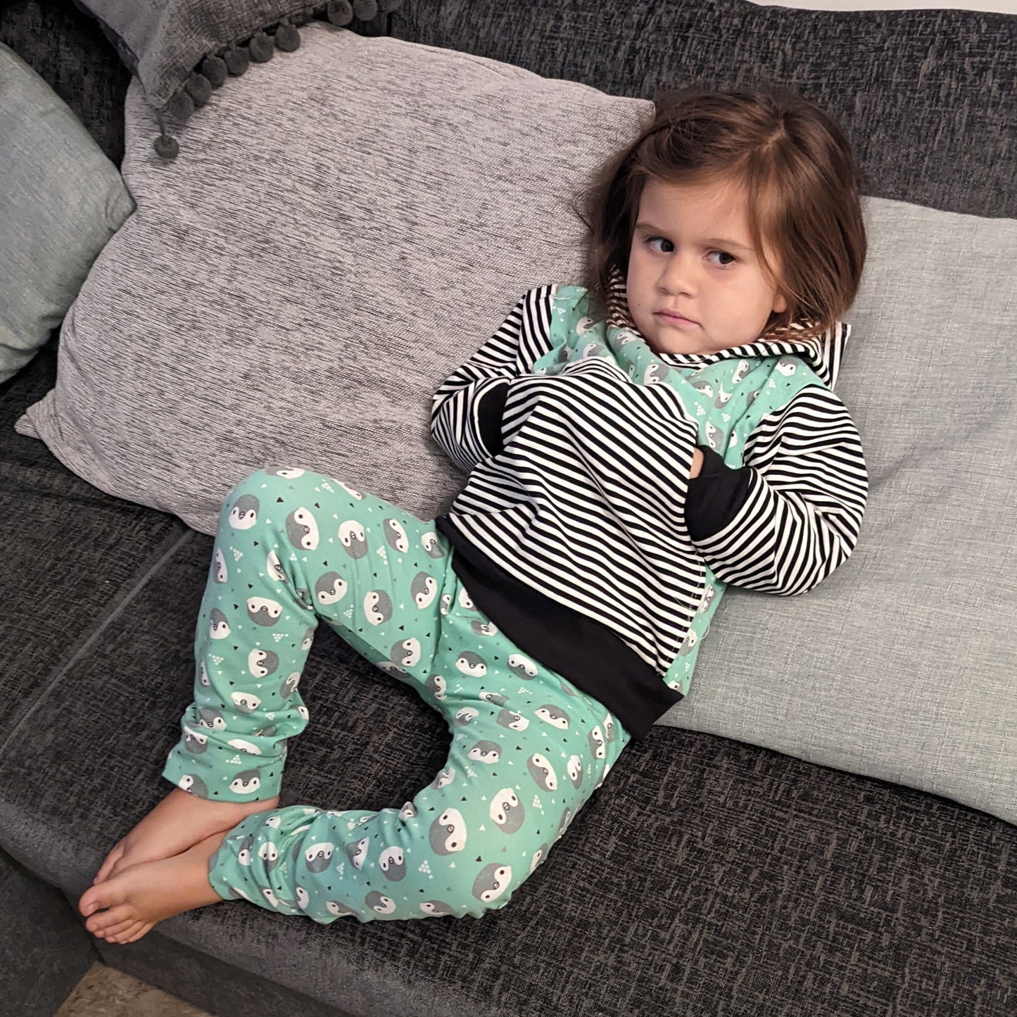 Sophie modelling her mint penguin hoodie with some matching organic harem joggers.
