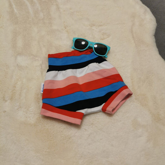 Colourful girls shorts, handmade from soft and stretchy colour striped cotton French Terry. With A comfortable non-elasticated waist.